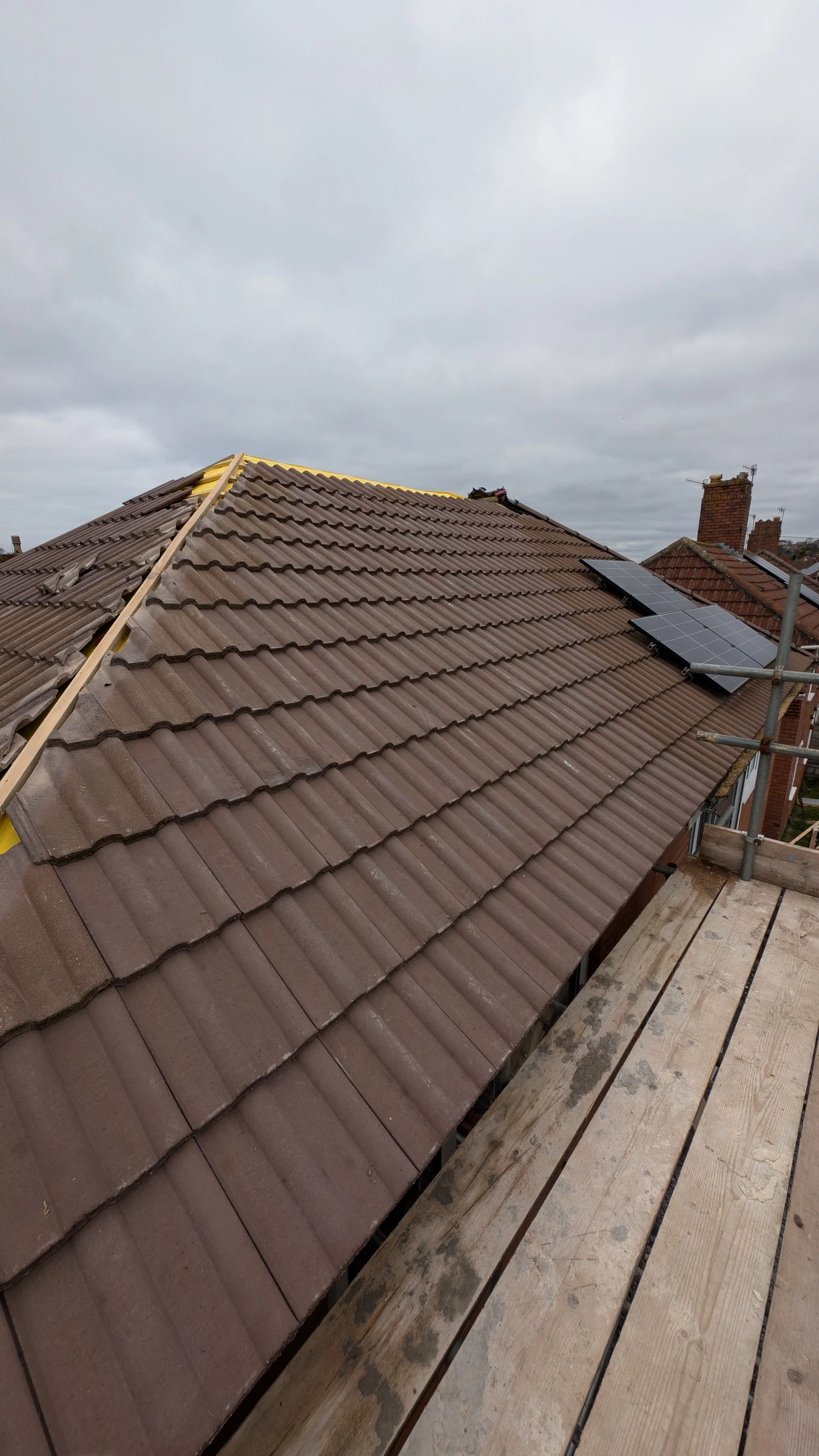 Roof tiles in place in Bedminster, Bristol
