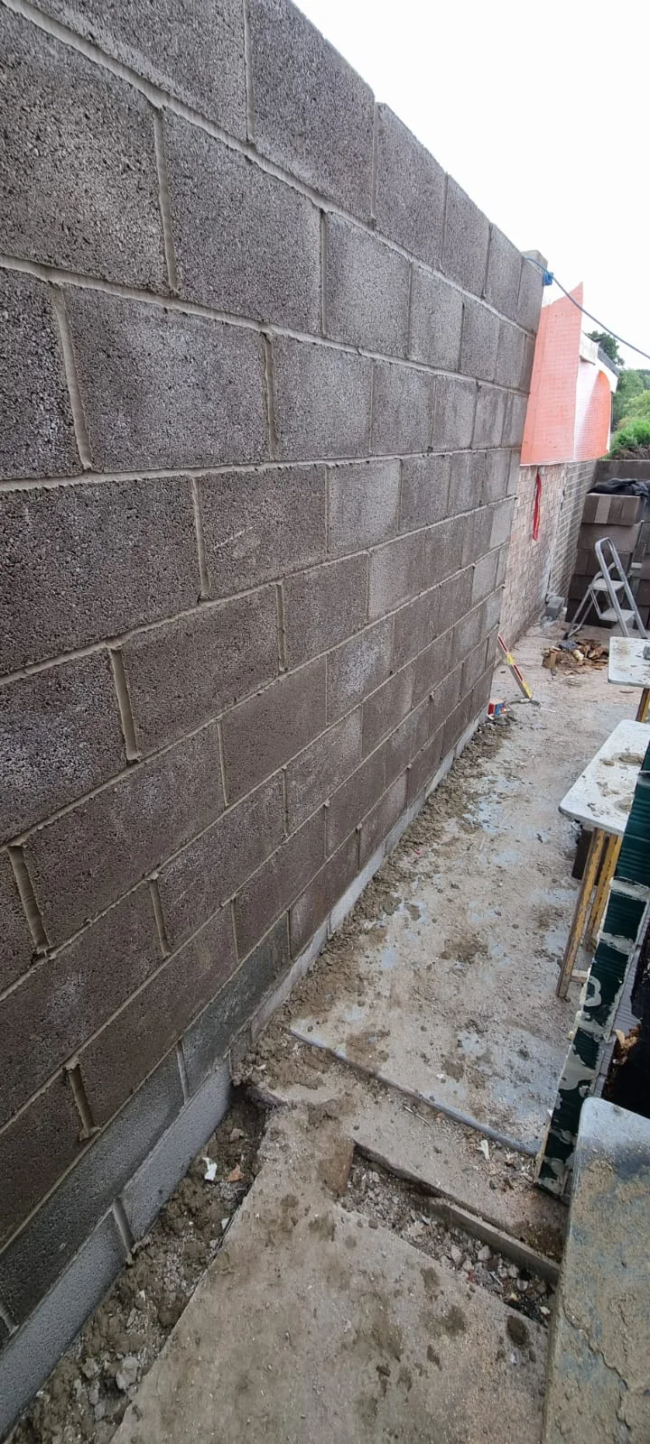New blockwork alongside the garage during the shell construction