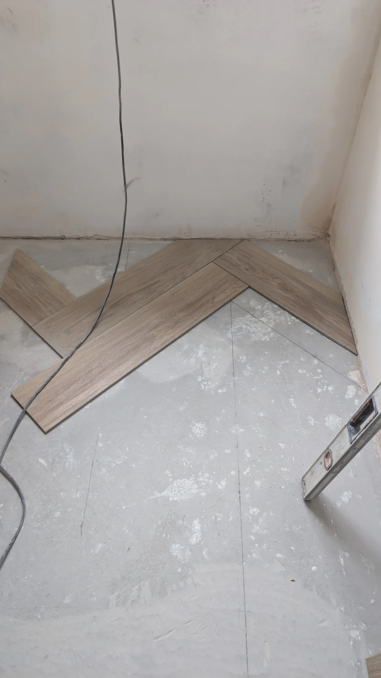 Close view of the floor tile layout inside the converted garage