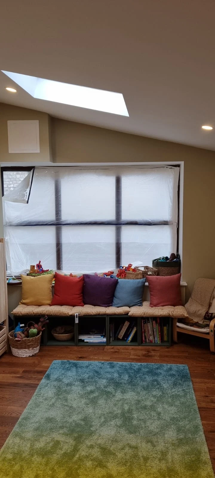 Completed room with a rooflight and seating