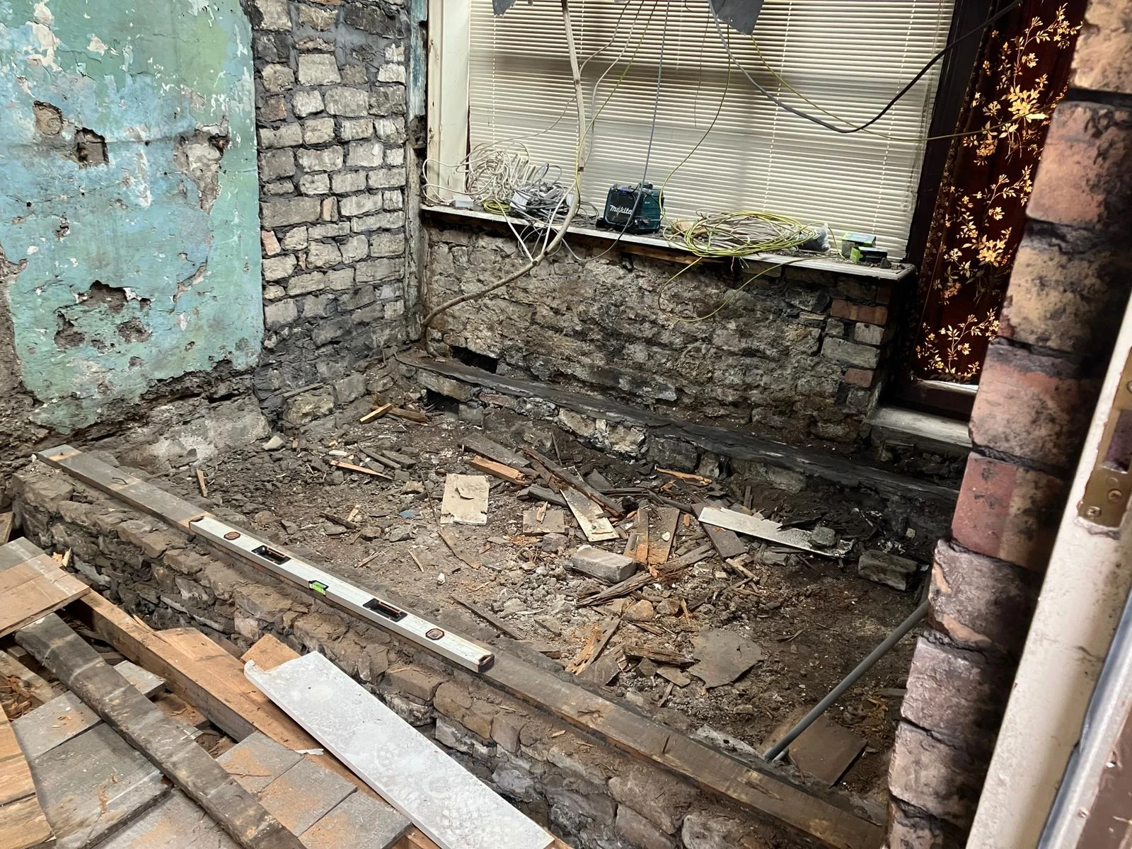 The existing floor opened up during the garage conversion