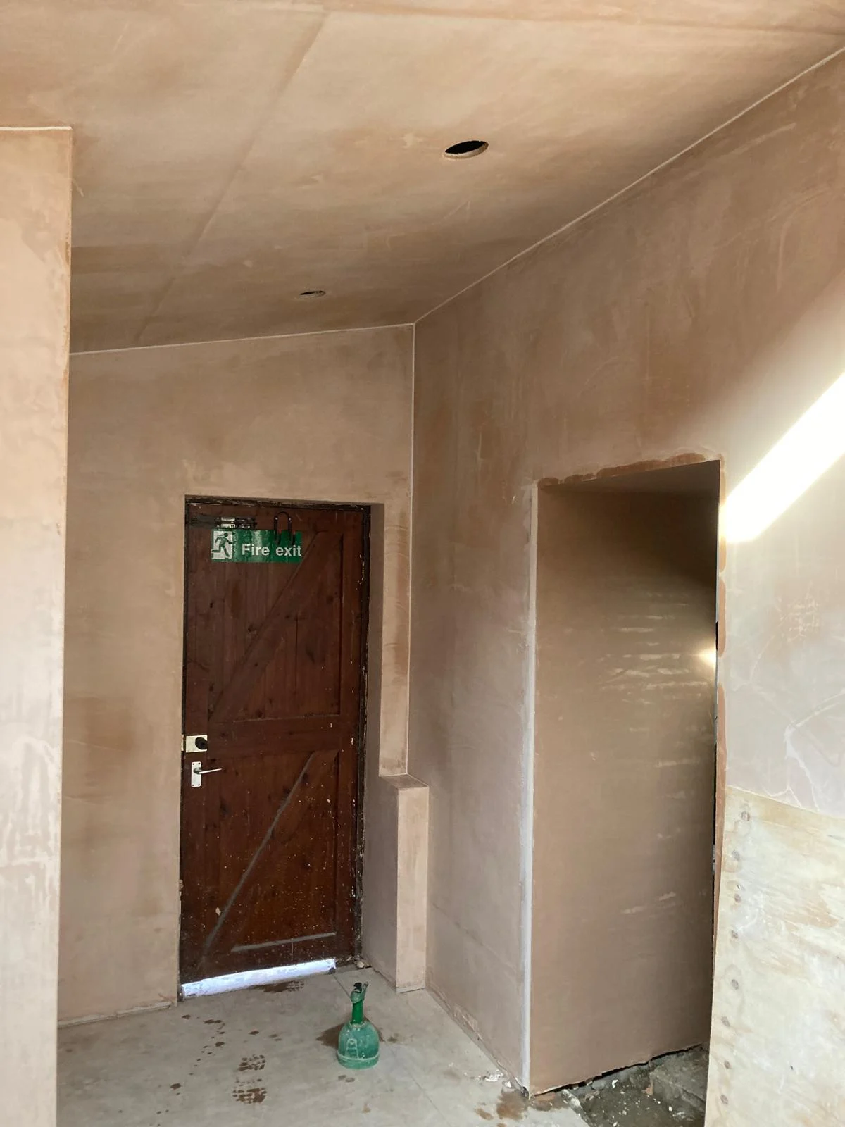 Plastered walls and doorway before decoration