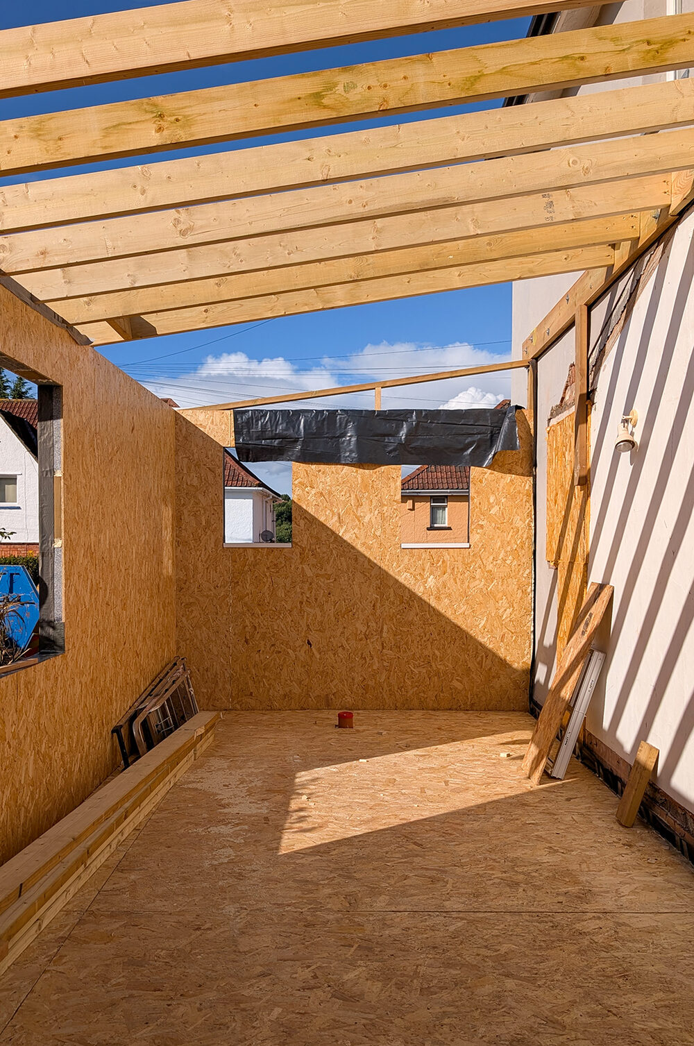 Timber-framed extension under construction